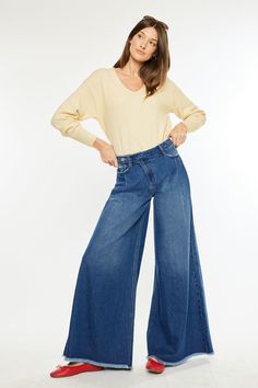 Discover our latest addition: the Marley High Rise Super Wide Leg Jeans! In a beautiful Dark Wash with a super wide leg that is absolutely captivating. This style is Rigid, so it won't lose its shape no matter how many times you wash it. With a minor frayed hem, a slightly crossover waistband, a single button closure with a regular zip fly. 11" Rise / 32" Inseam / 18" Leg Opening in Size 5/26 79.8% Cotton, 20.2% Tencel Model in size 3/25 Style # : KC7477D Stretchiness Level >> Rigid SIZE WAIST H Super Wide Leg Jeans, Petite Curvy, Fitted Joggers, Outwear Jackets, Romper Pants, Dress Romper, Wide Leg Jeans, Plus Clothing, Short Tops