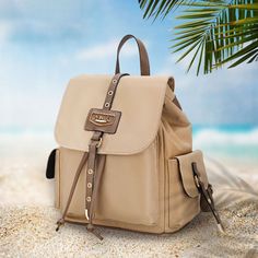 Beachside essentials: Shades? Check! A stylish backpack? Check🤎 🏖️ Our Paula backpack is the ultimate on-the-go bag, crafted of lightweight nylon and polished vegan leather! Now on sale!✨ #backpack #beachaccessories #mkfcollection Beige Backpack With Pockets, Beige Backpack With Leather Trim For Travel, Beige Leather Trim Backpack For Travel, Beige Nylon Backpack Shoulder Bag, Daily Use Nylon Backpack With Leather Trim, Nylon Backpack With Leather Trim For Daily Use, Nylon Satchel Backpack With Adjustable Strap, Brown Nylon Backpack With Adjustable Strap, Casual Nylon Bag With Leather Trim