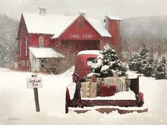 a red truck parked in front of a snow covered house with a christmas tree on the back