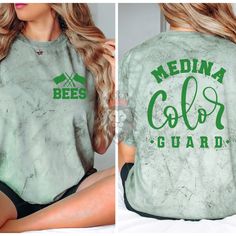 Show off with this custom and personalized Color Guard mascot design. These shirts and sweaters are great gifts for school teams, Color Guard camp spirit wear, seniors, varsity Color Guard coaches, Color Guard Moms, Dads and the whole family! You can customize the colors in the personalization section to reflect your favorite color guard team. It is trendy to size up 2 sizes for an oversized look or size down for a tighter fit.  To add a name (and or number) to the back of a shirt, add lounge pants, expedite processing, add overnight shipping, and any other miscellaneous items- please follow this link: https://www.etsy.com/shop/KASPDesign?ref=seller-platform-mcnav§ion_id=27547745 The listing is for one garment. To order... 1. Select the style and size you would like, then the color for the Colorguard Shirt, Homecoming Spirit, Comfort Colors Tshirt, Miscellaneous Items, Color Guard, Mascot Design, Spirit Wear, Comfort Colors Tee, Senior Year