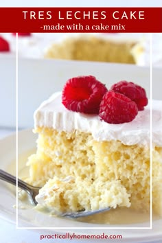 a slice of tres leches cake with white frosting and raspberries on top