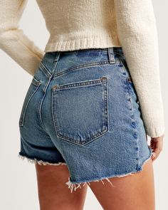 Elevate your summer style with the Abercrombie & Fitch Women's Curve Love High Rise Mom Shorts. These shorts are designed specifically to flatter with a high-rise waist and a relaxed fit through the hip and thigh, ensuring no waist gap and superb comfort. Perfect for those who appreciate a bit of vintage charm, they feature a medium wash vintage stretch denim accented with distressed details and a trendy raw-cut hem.

- Size: 36
- Color: Medium Wash
- Material: Denim, Pocket Bag: Cotton, Polyest High-waisted Shorts For Everyday Wear, High Waist Shorts For Everyday Wear, High Waist Shorts For Everyday, Fitted High Rise Shorts For Everyday, Everyday High Rise Fitted Shorts, Fitted Mid-rise Shorts For Everyday, Medium Wash Relaxed Fit Bottoms With 5-inch Inseam, Female Features, No Waist