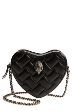 A signature crystal-encrusted eagle head embellishes the geo-quilted exterior of a heart-shaped leather bag fashioned with a chain crossbody strap. Lined Leather Imported Heart-shaped Leather Evening Shoulder Bag, Evening Heart-shaped Leather Shoulder Bag, Luxury Leather Heart-shaped Shoulder Bag, Luxury Leather Heart-shaped Bag, Luxury Heart-shaped Leather Bag, Luxury Black Heart-shaped Shoulder Bag, Designer Heart-shaped Leather Bag, Luxury Black Heart-shaped Bag, Luxury Heart-shaped Shoulder Bag