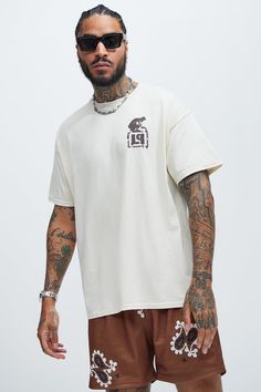 Available In Off White. Crew Neck Short Sleeve Screen Print 100% Cotton Disclaimer: Due To The Printing Process A Difference In Saturation May Occur. Each Garment Is Unique. Print Placement Will Vary. Imported | Mens Linkin Park Meteora Track List Oversized Short Sleeve Tee Shirt in Off White size 2XL by Fashion Nova Beige Relaxed Fit Shirt For Streetwear, Oversized Beige T-shirt With Graphic Print, Beige Relaxed Fit Shirt With Graphic Print, Relaxed Fit Beige Shirt With Graphic Print, Beige Graphic Print Shirt With Relaxed Fit, Oversized Beige Graphic Tee, Beige Relaxed Fit Tops For Streetwear, Beige Graphic Tee For Streetwear, Oversized Beige T-shirt For Streetwear