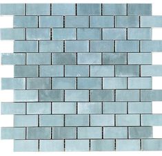 a blue brick wall with white and gray tiles on the bottom, one side is shown