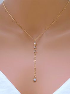 "CZ Drop in14k Gold Fill Necklace. Bridal jewelry. Layering necklace. It is sending alone and prefect for combination. All metal components onto Sterling silver . The picture length is 16\". The necklace is made of.. - 4mm 3 of 14k gold fill 3mm CZ dots, - 5mm 14k gold fill CZ dots, -14k gold fill Cable chain with spring claw. -Come up with ribbon gift box and -One Set of Care instruction package. Gold Layered https://www.etsy.com/listing/215630452/double-layered-gold-initial?ref=shop_home_activ Double Gold Necklace, Dainty Cubic Zirconia Backdrop Necklace For Gift, Dainty Cubic Zirconia Backdrop Necklace Gift, Delicate Clavicle Chain Backdrop Necklace For Weddings, Rose Gold Wedding Necklace With Elegant Design, Wedding Backdrop Necklace With Clavicle Chain, Delicate Chain Cubic Zirconia Backdrop Necklace As A Gift, Silver Delicate Chain Wedding Jewelry, Silver Jewelry With Delicate Chain For Wedding