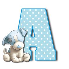 a blue and white elephant sitting next to the letter a with polka dots on it