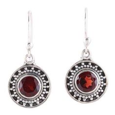 Sparkling with red hues 1.5 carats of circular garnet gems are featured in these dangle earrings from India. Alok Jain presents the earrings crafted of sterling silver by local artisans. Red Garnet Round Earrings, Red Birthstone Round Earrings, Nickel-free Round Garnet Jewelry, Round Garnet Jewelry For Pierced Ears, Garnet Jewelry With Matching Round Earrings, Classic Round Garnet Earrings, Garnet Round Earrings For Anniversary, Garnet Earrings For Anniversary, Round Garnet Earrings For Anniversary