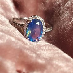 Gorgeous Mermaid Topaz Ring With Cz Halo And 925 Stamp. Nwot Never Worn. Features An Electric Blue To Purple To Green To Pink Flash.