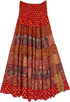 An ensemble that looks like the fiery phoenix, this is a two-in-one skirt and a dress.  With a smocked top part of the piece, it gives a very flattering look. #tlb #vacationclothing #Fall #Floral #Printed #Paisley #bohemianfashion #Indian #Silkskirt #smockedskirt #redskirt #combinedskirtdress Fitted Red Dress With Gathered Skirt, Fitted Tiered Dress With Lined Skirt, Red Bohemian Flared Maxi Skirt, Red Flowy Maxi Skirt In Hippie Style, Flowy Red Maxi Skirt In Hippie Style, Red Flowy Hippie Maxi Skirt, Bohemian Long Skirt Dress For Fall, Red Gathered Maxi Skirt For Summer, Bohemian Long Dress For Fall