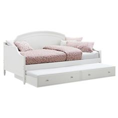 a white bed with drawers underneath it and a pink blanket on the bottom bunkbed