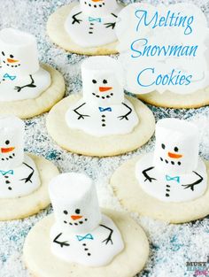 snowman cookies decorated with frosting on top of each other