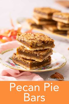 pecan pie bars stacked on top of each other with text overlay that reads pecan pie bars