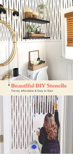 a woman is painting the wall in her bathroom with black and white stripes on it