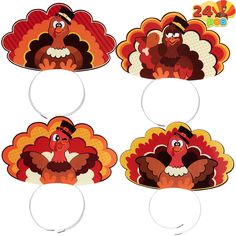 four turkeys with hats on them hanging from the top of each one's head