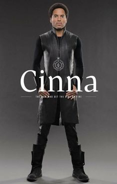 a man standing in front of a black background with the words cinna on it