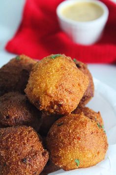 hush puppies on a white plate with the title