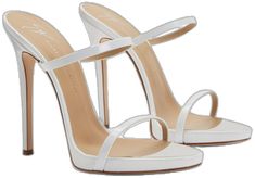 Classic White Sandals With 4-inch Heel, Classic White Synthetic Heels, White Patent Leather High Heels, Luxury White Synthetic Sandals, Luxury White Open Heel Sandals, Classic White High Heel Sandals, Elegant White Sandals With Padded Heel, White Patent Leather Heels With 4-inch Heel, Luxury White Heels For Party