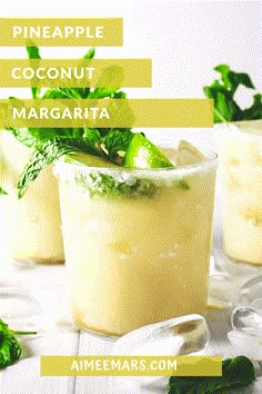 pineapple coconut margarita with lime and mint garnish on the rim, served in glasses