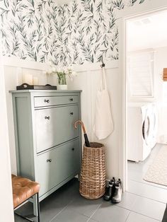 a bathroom with a sink, mirror and cabinet in it