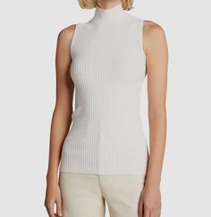 $350 Proenza Schouler Ivory Sleeveless Cutout Turtleneck Sweater Size M Description Proenza Schouler White Label rib-knit sweater. Turtleneck. Sleeveless. Slim fit. Cutout back. Slipover style. Viscose/polyester. Imported. About Us We sell only 100% authentic clothing from new with tags to gently used. We have a 100% authentic or money back guarantee on every item we sell. Items are listed daily so make sure to put us on your favorite! Most of our items come from a nationwide high end dept store. We have been in business for over 10 years selling tens of thousands of designer items. We strive to meet your designer needs at a quality price! Payment Shipping Returns Payment accepted via paypal, credit/debit card. Shipping is usually within 24 hours of purchase (M-F). Super fast service. Trac Turtleneck Sleeveless, Sweater Turtleneck, Ribbed Knit Sweater, White Label, Proenza Schouler, Turtleneck Sweater, Sweater Outfits, Knit Sweater, Rib Knit