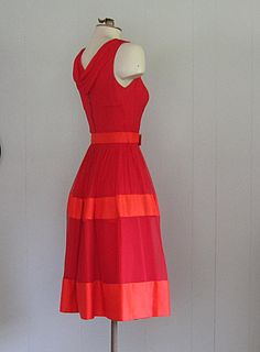 APPROXIMATE MEASUREMENTS (INCHES): Current Size: S Bust: 34 Waist: 25 Hip: OPEN Bodice (shoulder to waist): 14 1/2 Skirt (waist to hem): 26 CONDITION Excellent DESCRIPTION 1950s cocktail dress Sheer chiffon overlay Acetate lining/slip Wide satin trim Original belt Draped chiffon neckline Clown Dress, 1950s Cocktail Dress, Tiki Dress, Sleeveless Party Dress, Betty Dress, Red Cocktail, Red Cocktail Dress, Chiffon Overlay, 1950s Dress