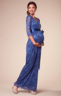 For a dazzling pop of regal colour, our Katie Maternity gown in Windsor Blue is the perfect partner to your after dark season’s party invites. With a beautifully shaped scooped neckline and floor length skirt lined in premium jersey, our sweeping, full length lace maternity gown will become a cherished part of your evening wardrobe. The ¾ sheer sleeves make it flattering and ideal for the cooler months while the elegant stretch floral lace provides all the opulent detail you desire. We’ve includ Fitted Floor-length Maternity Dress For Prom, Blue Maxi Maternity Dress For Party, Blue Floor-length Maternity Dress, Blue Maxi Length Maternity Dress For Wedding, Blue Maxi Maternity Dress For Wedding, Blue Maxi Length Maternity Dress, Blue Floor-length Maternity Gown, Elegant Blue Floor-length Maternity Dress, Floor-length Blue Maternity Gown