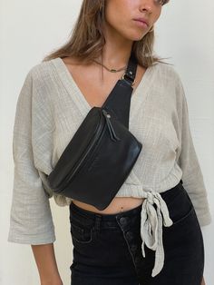 Say hello to the Remy in Black– now rocking a glow-up with a closed-zipper design and secret features like a key leash, extra inner pocket and hidden essential-holders. The Remy is the one where it all began. Each of these original fanny packs has been handmade by our artisan friends in Bali or Mexico with luxurious craftsmanship and the most love. Designed to dress up or down year-round, enjoy more hands-free freedom with these OG fanny packs that effortlessly transition from day to night. Mini Hip Pack, Over The Shoulder Bags, Waist Pouch, Leather Fanny Pack, Festival Bag, Leather Belt Bag, Bum Bag, Nails Inspo, Summer 2023