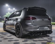 the rear end of a grey volkswagen golf gtr