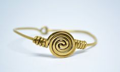 Beautiful handmade women's cuff bracelet with spiral motif. Suitable for men too. Perfect for any outlook and everyday use!! Adjustable. Handmade Adjustable Spiral Cuff Bracelet, Adjustable Spiral Gold Bangle, Adjustable Gold Spiral Bangle, Spiral Metal Cuff Bracelet As Gift, Adjustable Metal Spiral Cuff Bracelet, Womens Cuff Bracelets, Brass Cuff Bracelet, Brass Cuff, Brass Bracelet