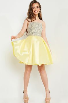 Indulge in the exquisite elegance of the Jovani K00722 dress from the Spring 2024 collection. Elevate your style with this sophisticated masterpiece. Yellow Ball Gown For Evening, Spring Formal Ball Gown With Fitted Bodice, Elegant Yellow Ball Gown Dress, Elegant Yellow Ball Gown, Elegant Yellow A-line Evening Dress, Luxury Strapless Spring Dresses, Elegant Yellow Satin Gown, Spring Embellished Ball Gown Dresses, Embellished A-line Satin Dress