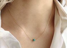 "This dainty turquoise necklace is the December birthstone and is available in gold filled, sterling silver, rose gold filled and 14k gold. A minimalist necklace that is lightweight and subtle making it the perfect everyday necklace. The single turquoise pendant is suspended from a dainty cable chain and is available in every birthstone month including other popular gemstones. Model is wearing the 16\" necklace in gold filled. If you need your order by a certain date, it is very important to sen Dainty Turquoise Necklace, Gold Adjustable Minimalist Turquoise Necklace, Dainty Turquoise Necklace With Delicate Chain, Minimalist Turquoise Gemstone Necklace, Dainty Blue Turquoise Necklace With Adjustable Chain, Gift-ready Polished Turquoise Bead Necklace, December Birthstone Necklace, Everyday Necklace, December Birthstone