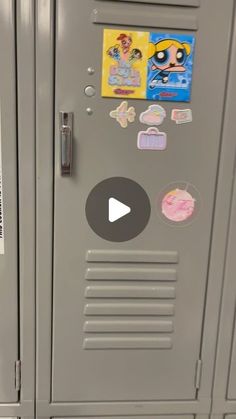 a locker with stickers on the doors