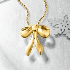 Ross-Simons - Italian 18kt Gold Over Sterling Bow Pendant Necklace. 18". Direct from Italy, our darling 18kt yellow gold over sterling silver bow necklace is right on trend. Uplift your look with this pretty ribbon pendant, bright with a high-polished finish and suspended from a classic rolo chain with a 2" extender. Lobster clasp, 18kt gold over sterling bow pendant necklace. Elegant Gift-wrapped Jewelry For Her, Gold Necklace With Ribbon For Gift, Gold Necklace With Ribbon Perfect For Gifts, Formal Gold Necklaces With Ribbon, Elegant Gold Necklace With Ribbon, Formal Gold Necklace With Ribbon, Elegant Jewelry For Anniversary, Gift Wrapped, Formal Gold Ribbon Necklace, Elegant Anniversary Jewelry Gift Wrapped