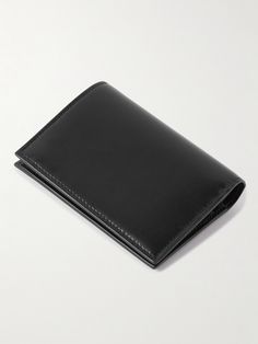 SAINT LAURENT's wallet is accented with a silver-tone version of its 'Cassandre' logo, the emblem isn't only iconic but also a marker of quality. Crafted from smooth black leather, it has a bill sleeve, four card slots and two slip compartments for notes and receipts. Saint Laurent Collection, Leather Billfold, Wallet For Men, Billfold Wallet, Saint Laurent Wallet, Black Wallet, Printed Leather, Mr Porter, Full Grain Leather