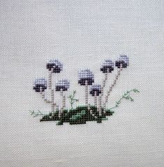 a close up of a piece of cloth with flowers on it