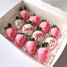 valentine's day strawberries in a box with i love you written on them