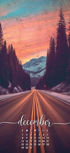 a calendar with the words december written on it in front of a road and mountains