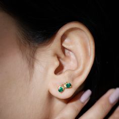 Product Details Step into style with these trendy and elegant Two Stone Stud Earrings, featuring captivating Round Cut Created Emeralds that add a touch of charm to your casual occasions. These Infinity Stud Earrings exude opulence and sophistication, making them a must-have accessory for elevating your everyday look. Embrace the allure of these captivating earrings and make a statement of timeless beauty and grace. Product Information SKU SHP-EARRINGS0621105396 Weight 1.44 gm (Approximate) LAB Elegant Gold-plated Birthstone Earrings, Elegant Gold Plated Birthstone Earrings, Green 14k Gold Hypoallergenic Earrings, Hypoallergenic 14k Gold Green Earrings, Dainty Round Earrings For May Birthstone, Green Gold Plated Earrings For Anniversary, Green Gold-plated Earrings For Anniversary, Anniversary Green Gold-plated Earrings, Hypoallergenic Formal Jewelry For May Birthstone