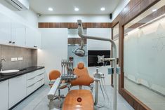 a dentist's office with dental equipment in it