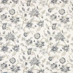 a white and blue flowered wallpaper with black flowers on the bottom half of it