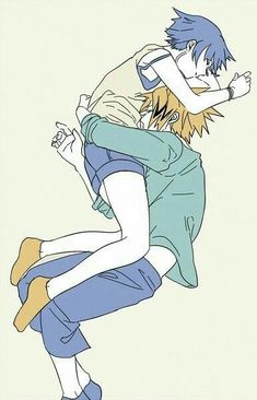 two people are hugging each other while one person is wearing blue and the other has yellow hair