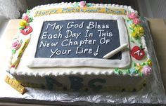 a cake that is sitting on top of a table in front of a sign saying, my god bliss each day in this new charter of your life