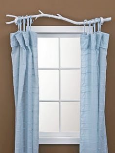 an image of a window with blue curtains