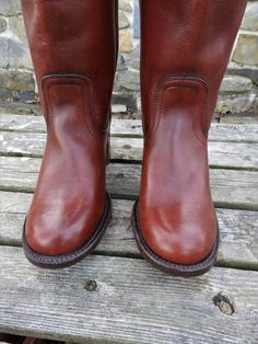 "Vtg 1970's Frye Dark Brown Western Boots, Heeled Ladies Boots, Leather Riding Boots sz 5 1/2 B This is a great pair of vintage ladies Frye Riding Boots. Known for their quality boots, these Frye Western Style Pull-On Boots are no exception. They are almost a deep reddish brown color with some distressing which I really like. These boots are well marked with the Frye mark at the heel of the boot as well as on the inside. Made of very thick and durable leather, these boots are certain to last for Frye Riding Boots, Brown Western Boots, Black Coat Men, Ladies Boots, Leather Riding Boots, Pull On Boots, Boots Leather, Reddish Brown, Western Cowboy Boots