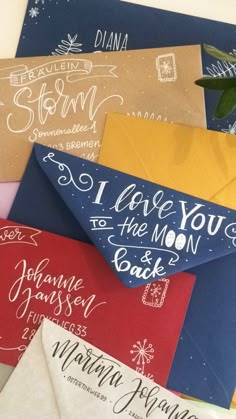 several envelopes with different types of writing on them