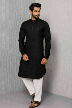 **Title "Mens Kurta, Tunic Men, Kurta Men - KURTAN Oversized Tee with Button Up and Asymmetric Side Cuts" **Description Discover the KURTAN, an elegant and comfortable oversized tee inspired by the traditional kurta style, perfect for hot climates and summer wear. This stylish piece features long sides, an asymmetric hem, and a top button-up design with sliced side openings, offering a blend of sophistication and casual charm. Ideal for pairing with various designs and styles. **Colors - Black Black Kurta Men, Ceremonial Black Kurta With Naqshi, Mens Black Kurta Designs, Tunic Men, Cotton Kurta For Men, Men’s Black Kurta, Front Open Kurta Men, Kurta Black, Traditional Kurta