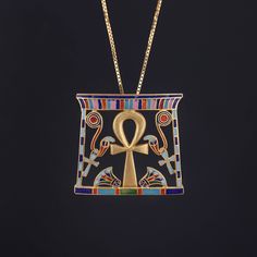 This vintage 18k gold pendant (circa 1980-1990) features an ankh flanked by enamel lotus flowers and snakes. The pendant measures 1.3 inches from top to bottom by 1.4 inches wide and is in great condition. We are providing the option to purchase the pendant or without the 24 inch, 14k gold chain depicted in the photos. We have many other fantastic offerings of period fine jewelry posted on our Etsy store, so please consider browsing our other items. We send all items in individually packaged gif Pharaonic Design, Gringotts Vault, Teapot Necklace, Ancient Egyptian Symbols, Ankh Necklace, Earthy Jewelry, Egyptian Revival, Jewelry Post, Lotus Flowers