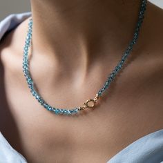 This Apatite gemstone necklace is made with extremely beautiful smooth 5 - 6.5mm beads. The necklace is knotted with a silk cord so it falls nicely on your neck. It is a great layering necklace or looks perfect and elegant on its own. Details: ✦ 14k solid gold clasp and end beads✦ 5-6.5mm AAAA Apatite beads smooth✦ Hand knotted with silk cord✦ Measures approx 18.25 inches ✦ Packaged in our elegant black Vivien Frank Jewelery box ✦ Follow us on INSTAGRAM: @vivienfrankjewelry✦ Follow us on FACEBOOK: facebook.com/vivienfrankdesigns✦ Follow us on PINTEREST: pinterest.com/VivienFrank✦ Visit our WEBSITE: vivienfrank.com Hand Knotted Necklaces Made On Silk Cord, Luxury Hand Knotted Adjustable Necklace, Blue Hand Knotted Round Bead Necklaces, Silk Knotted Gemstone Necklace, Fluorite Gemstone Beads Necklace For Gifts, Gift-ready Polished Turquoise Bead Necklace, Apatite Necklace, Hand Knotted Necklace, Silk Cord