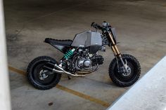 a dirt bike parked in a parking garage